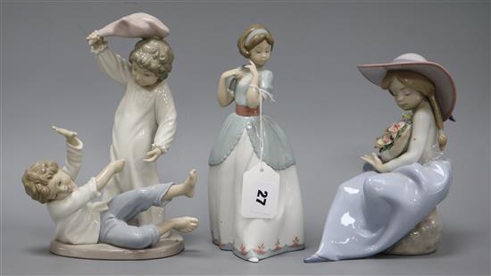 Two Lladro figures and a Nao figure tallest measures 24cm